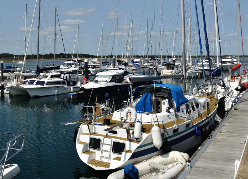 Sailing boats moored in a marina