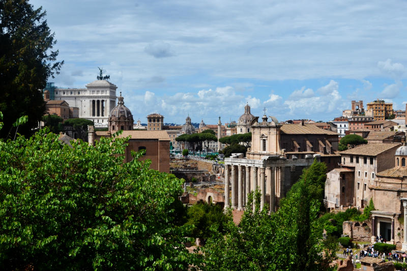 High view of the city with ancient buildings and sculptures